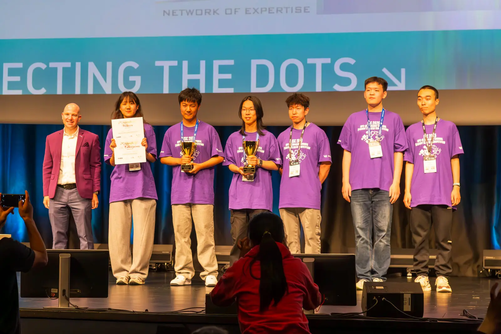 The team on stage at ISC 2025
